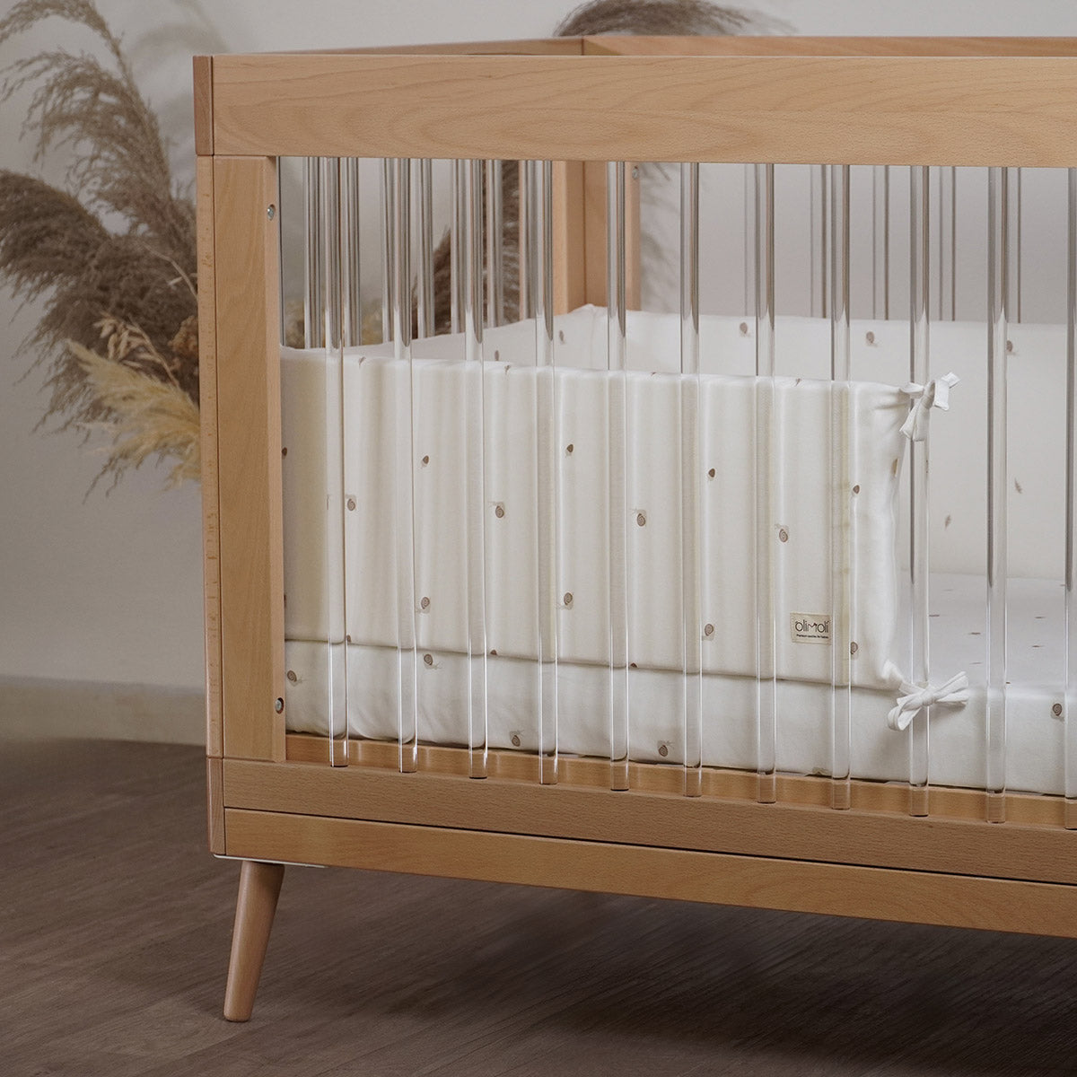 מגן ראש למיטת תינוק אולימולי ליין שבלול | Olimoli Snail Bed Head Bumper